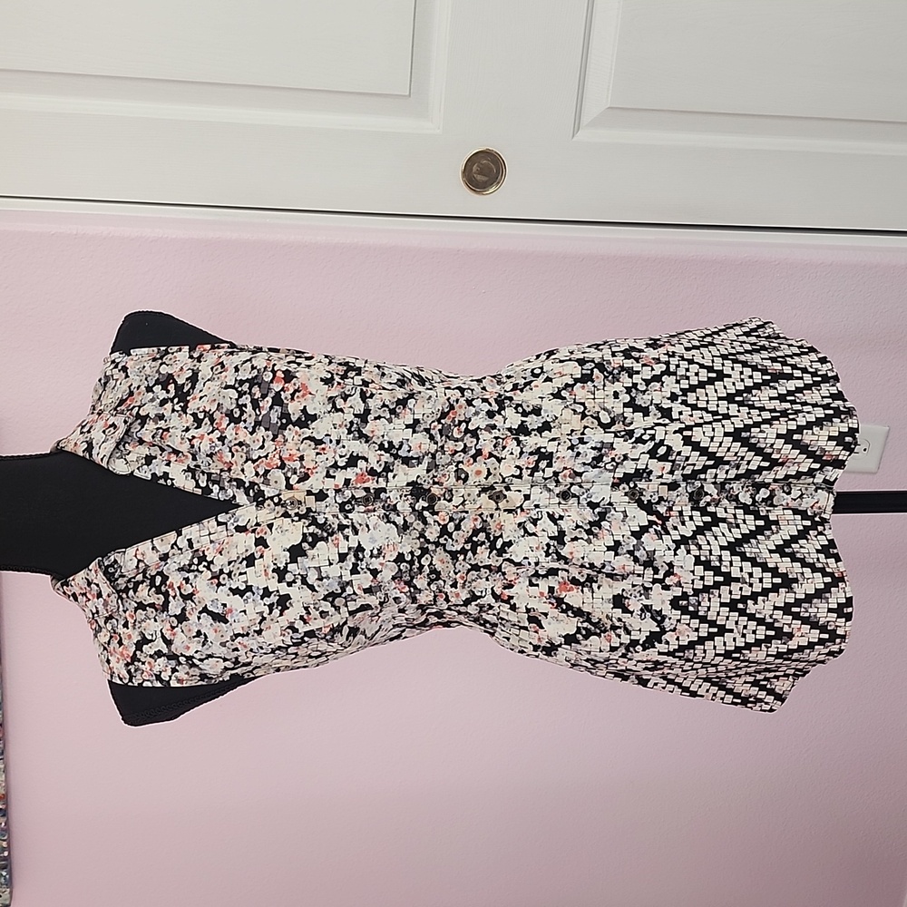 Candies peplum style top, size large, multi color print.